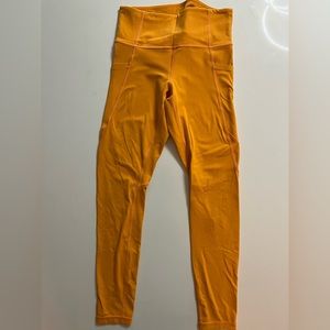 Athleta salutation stash tights